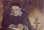 Vincent de Paul Reading at table. 